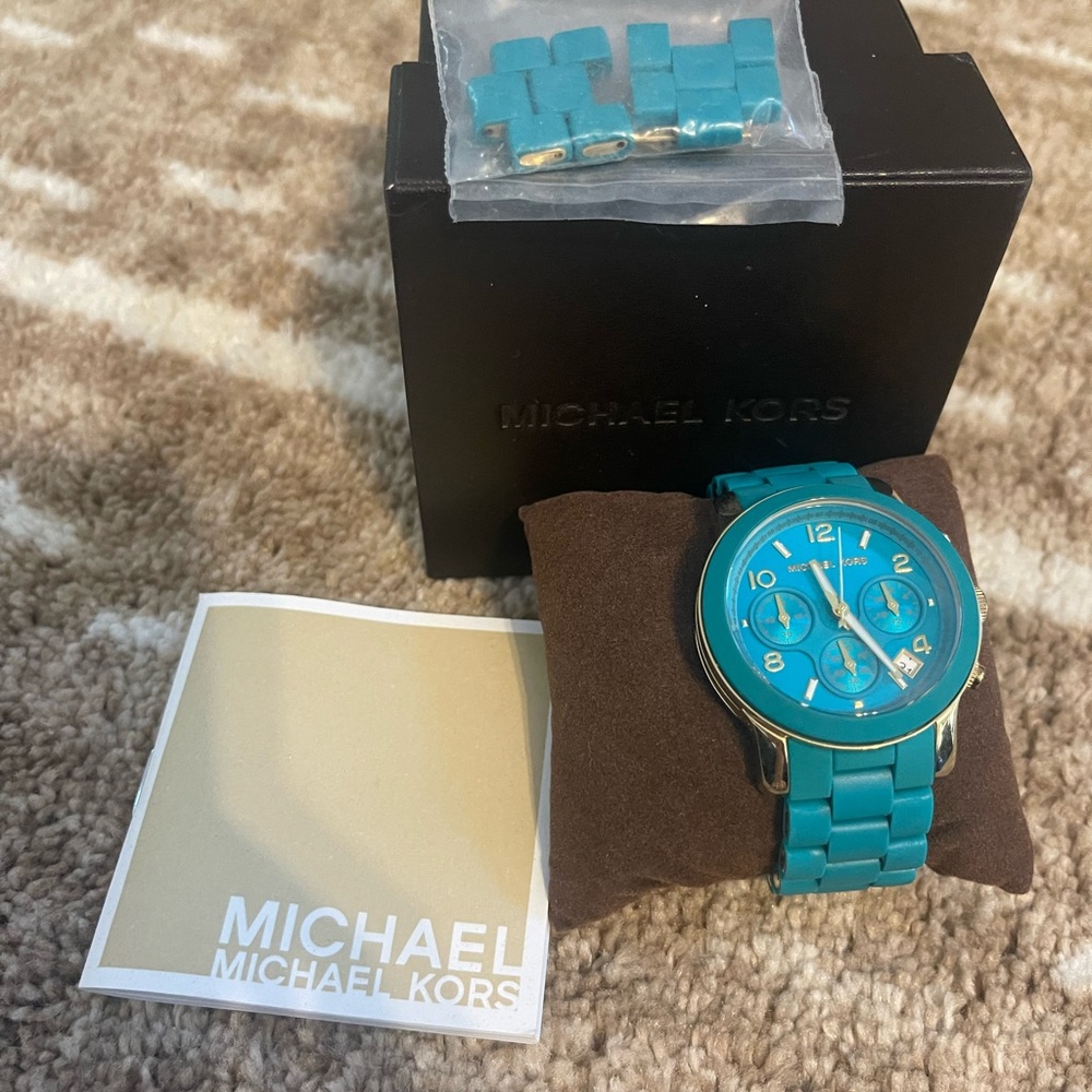 Michael Kors turquoise watch.